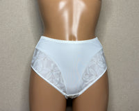 A pair of women's ivory panties with a floral pattern.