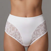 Ivory high-waisted briefs with sheer floral-patterned side panels, shown on a model against a solid gray background.