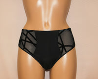 A pair of women's black geometric pattern classic panties.