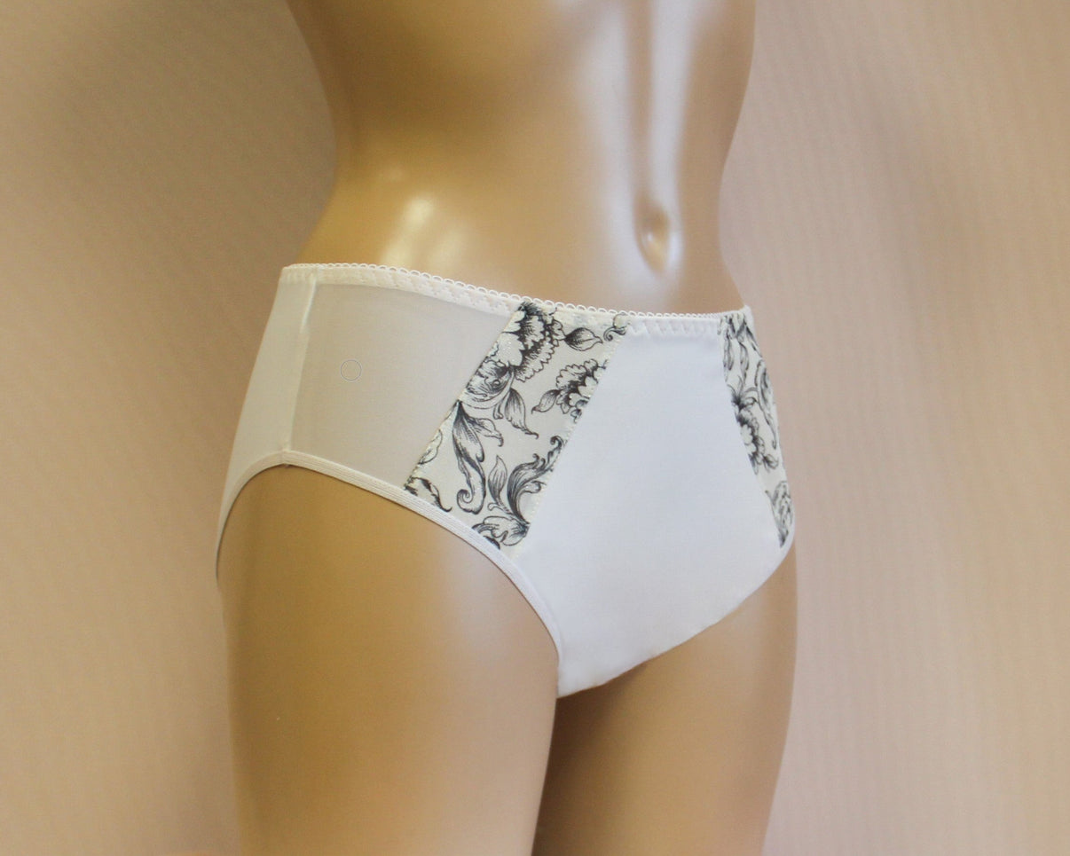 A pair of women's floral design panties. The panties have a multicoloured floral pattern.