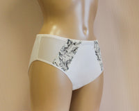 A pair of women's floral design panties. The panties have a multicoloured floral pattern.