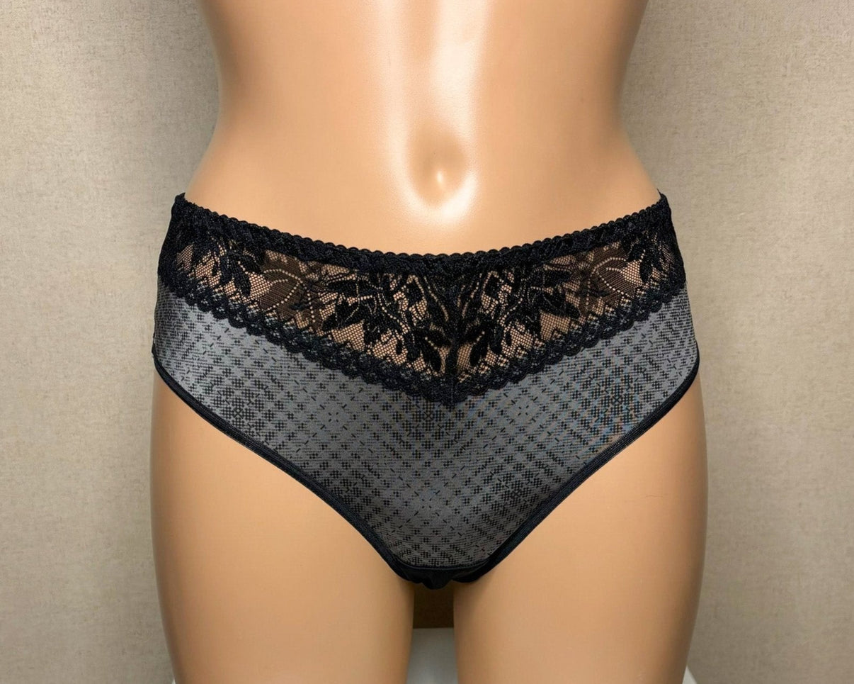 Women's black panties with a geometric pattern.