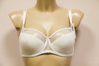 Light beige half padded bra with underwire.