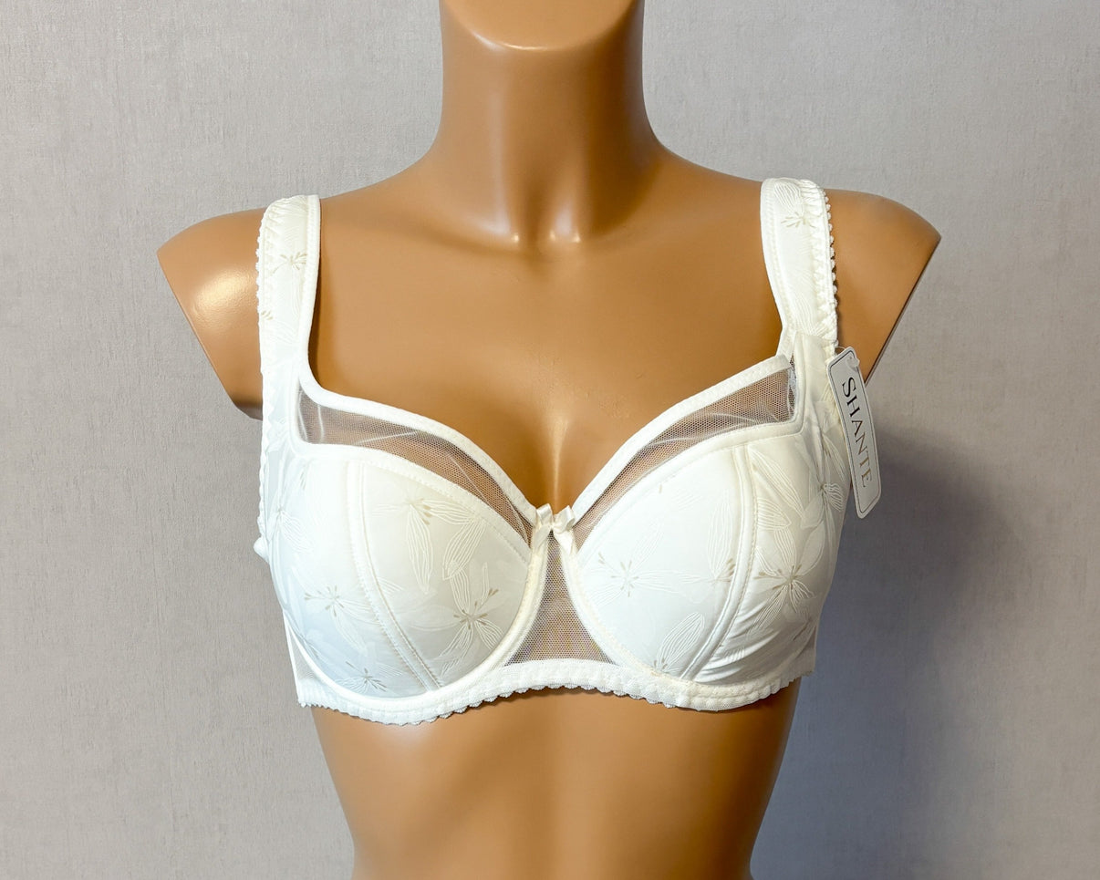 Ivory half-padded bra, featuring adjustable padded straps and underwired support.