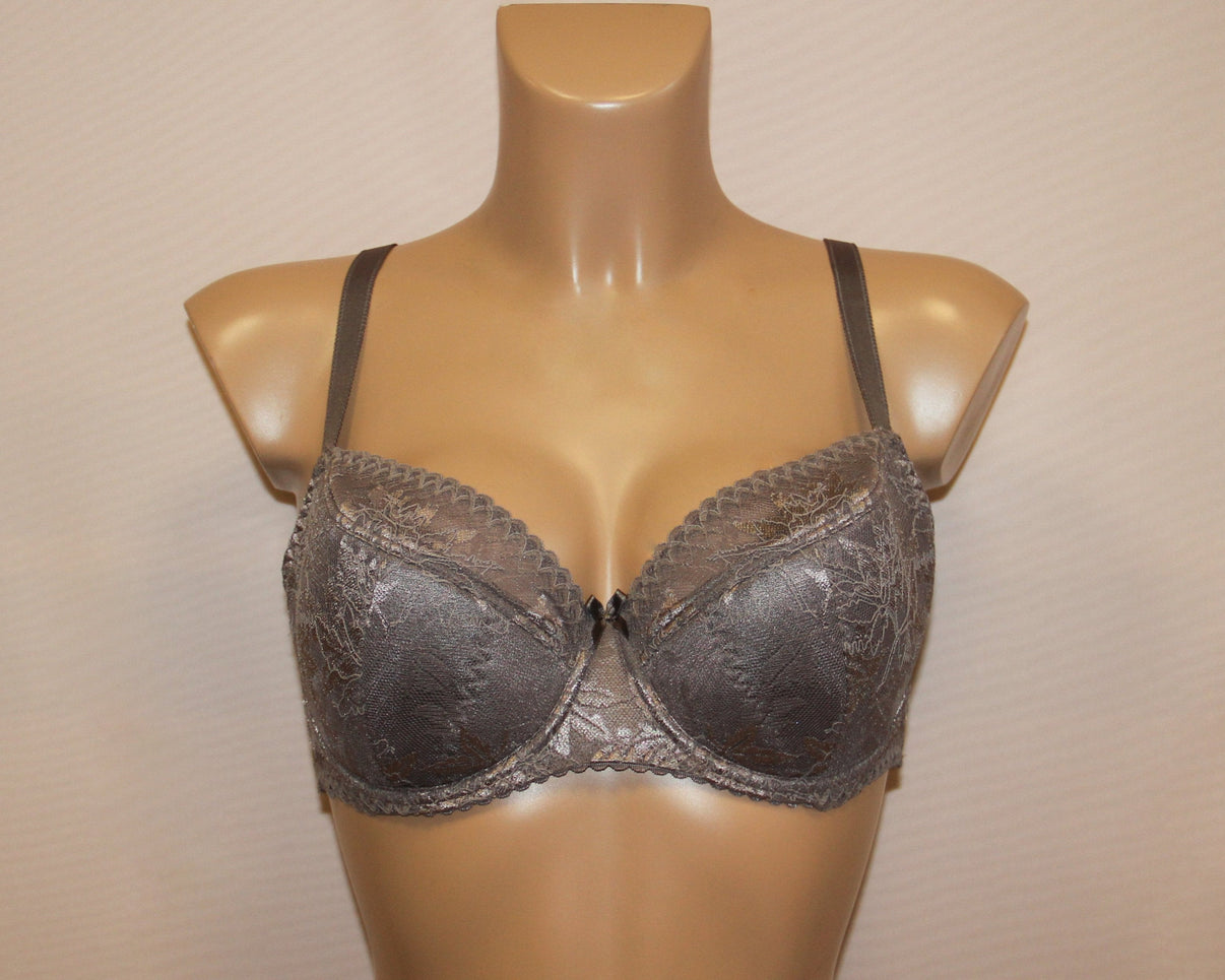 A half padded, underwired, brown lace bra with adjustable straps.