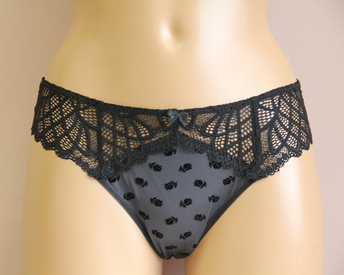 Woman's violet lace panties with a medium waist.