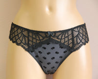 Woman's violet lace panties with a medium waist.