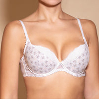 A woman's push-up bra with floral pattern in ivory color, featuring underwired support and cotton lining on cups.