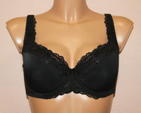 A black, half padded, underwired bra with adjustable straps and cotton lining on the lower part of cups.