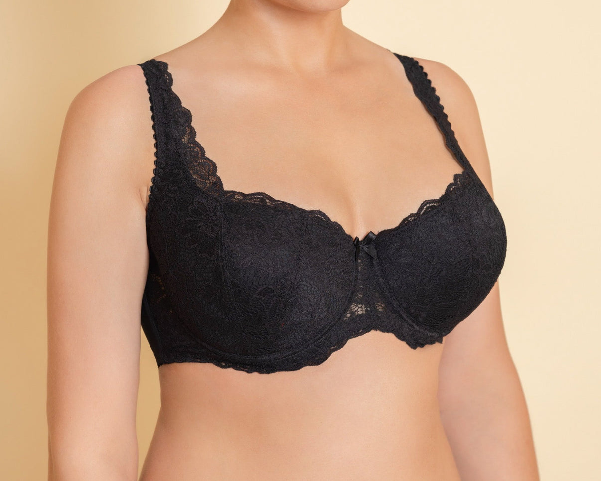 A woman's black padded balconette bra with adjustable straps and lace detailing on the cups and front.