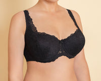 A woman's black padded balconette bra with adjustable straps and lace detailing on the cups and front.