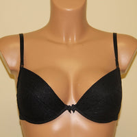 A black push-up bra with underwired support.