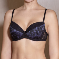 Blue push-up bra with floral lace pattern on the cups and adjustable straps.