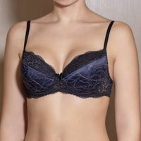 Blue push-up bra with a lace pattern and adjustable straps.