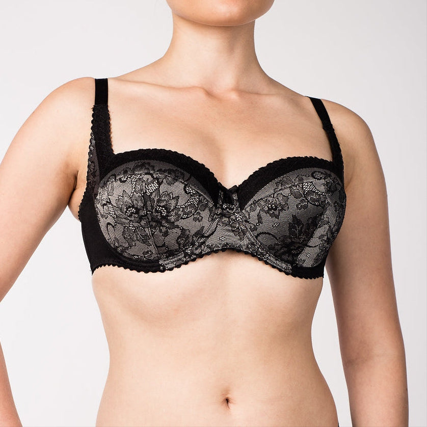 A grey padded bra with a flower pattern.