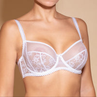 White soft cup lace bra with adjustable straps.